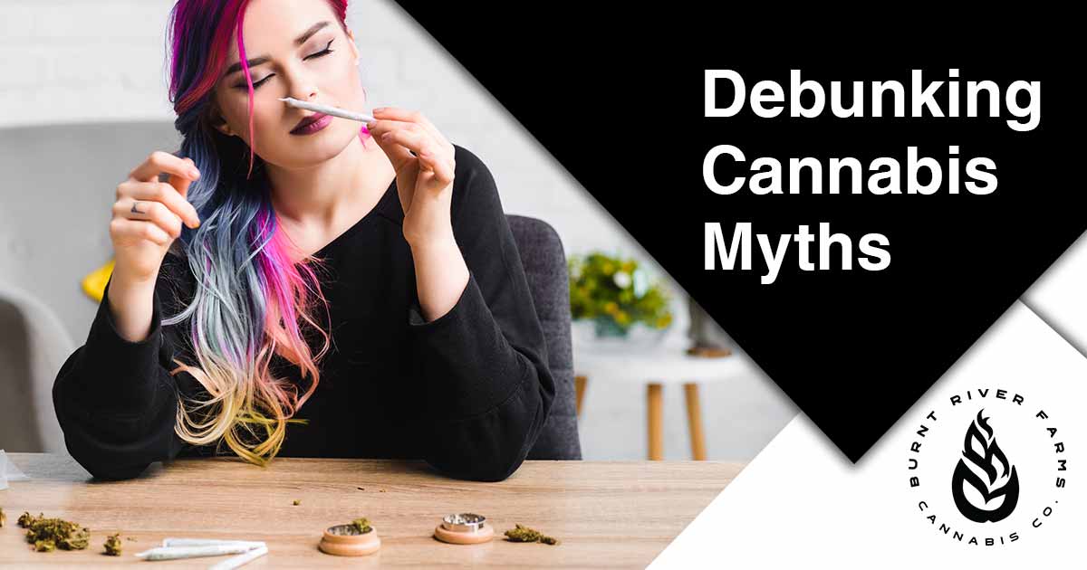 Burn River Farms - the woman is sitting at a table with fresh rolled cannabis joint. We debunk myths, provide accurate information and recommend specific brands of products that are perfect for your needs.